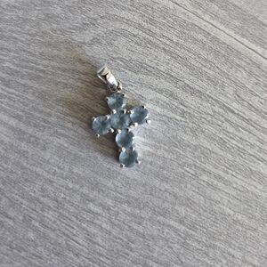 Elegant Cross Pendant with Light Blue Stones